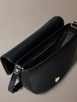 Calvin Klein Embossed Monogram Logo Saddle Bag Black